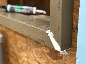 ThermalBuck high-performance window buck with Dap Dynaflex 800 sealant